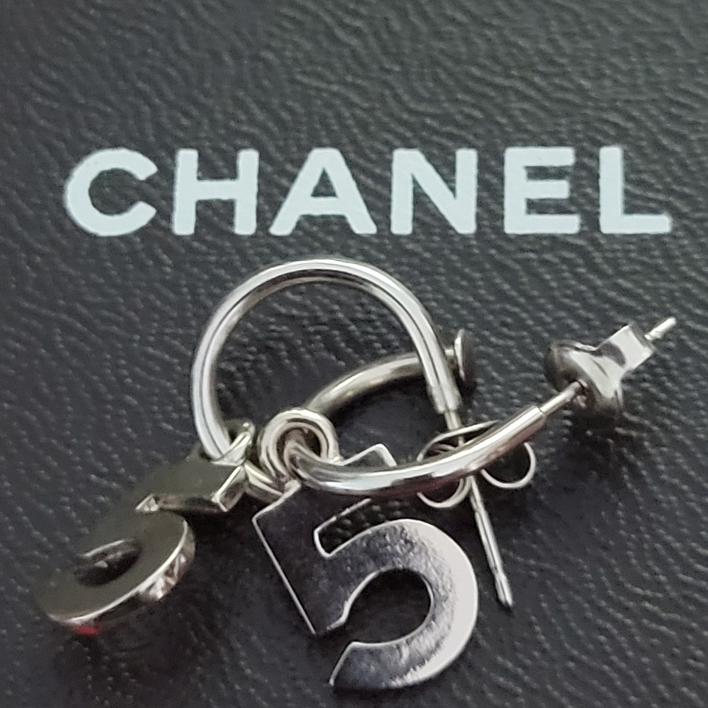 Chanel number 5 earrings with a COA included and box